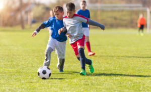 Children playing soccer