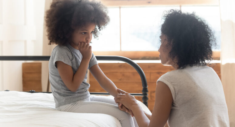 mom consoling daughter