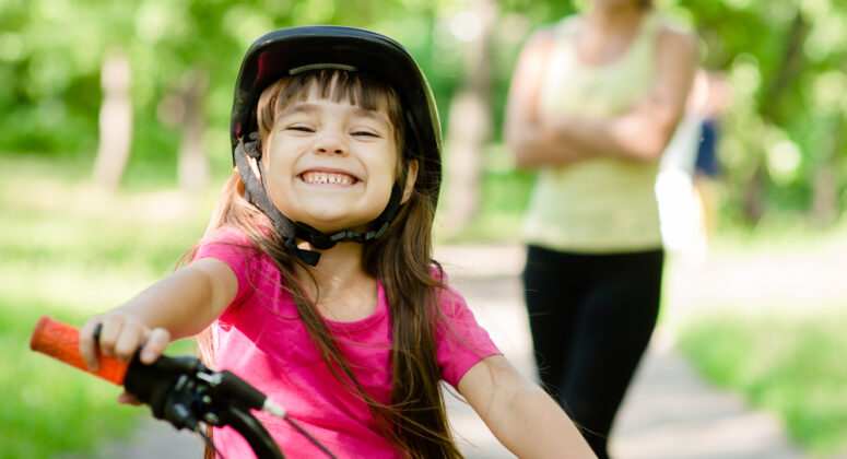 Girl riding bike.
